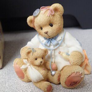 Dr Darlene Makebetter 1998 Symbol of Membearship Figurine